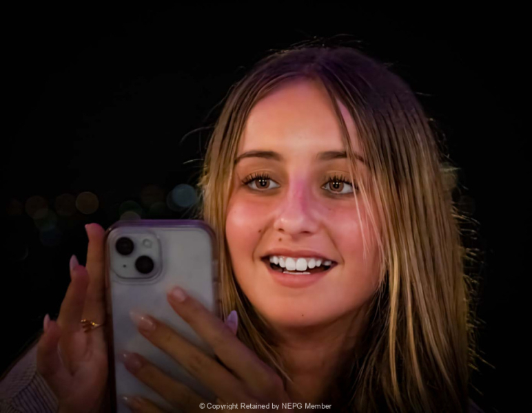 Projected-Subject-A-girl-and-her-phone-pure-joy-Jim-Coyle-Silver